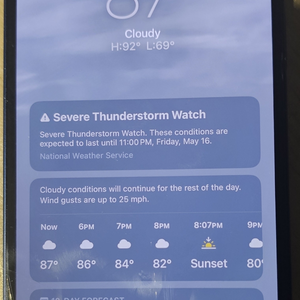 Smartphone with Weather App Display